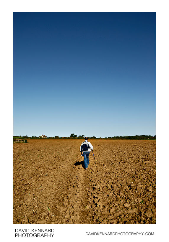 Walking across a ploughed field
