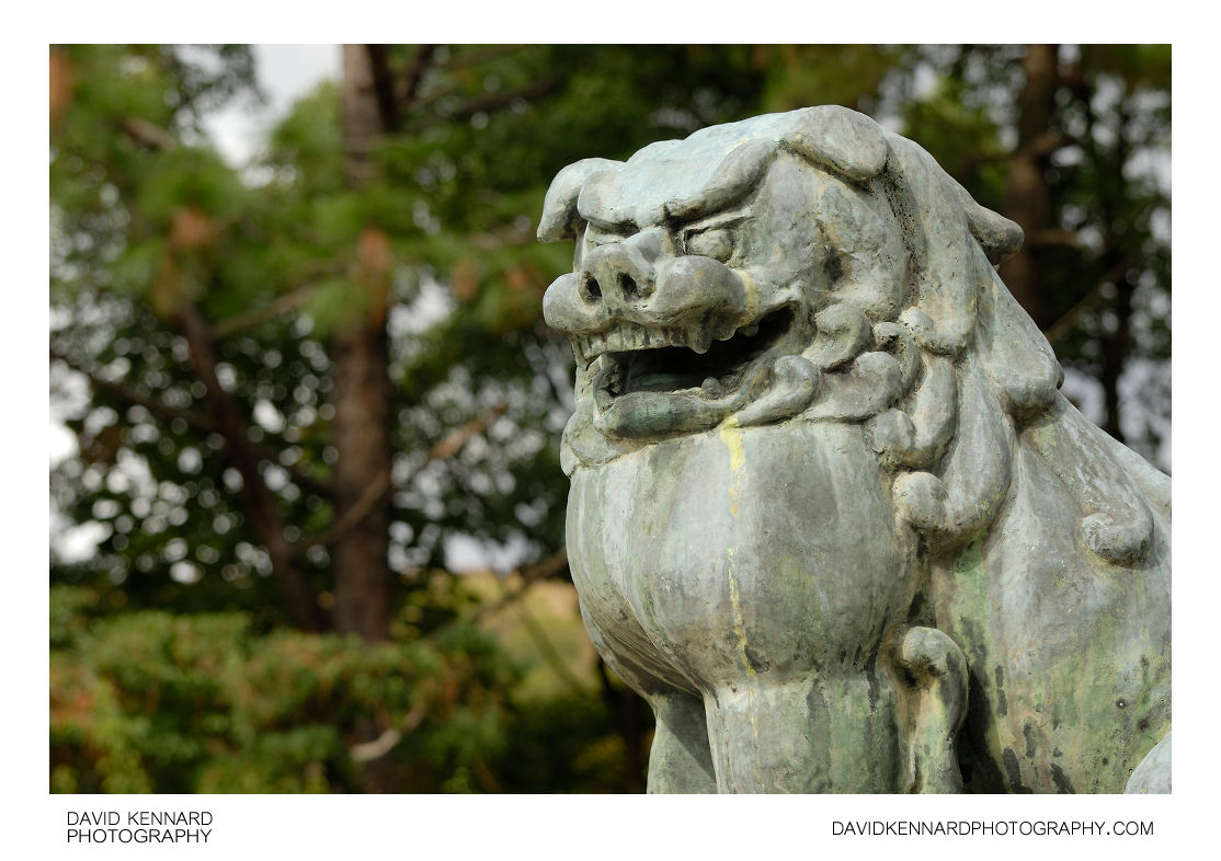 Lion guardian statue at Hokoku Shrine, Osaka