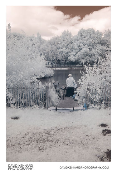 Infrared photo of a fisherman at Corby Boating Lake