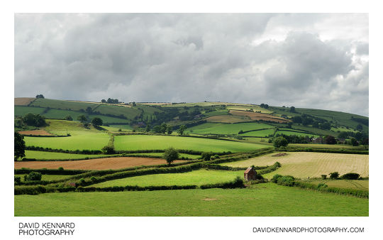 Fields and clouds viewed from Clun Castle Motte