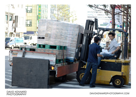 Forklift unloading paper delivery, Seoul