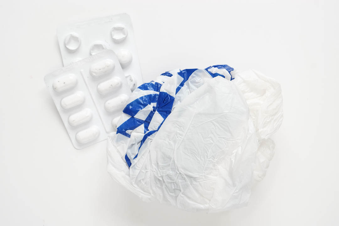 blister packs of pills and plastic bag