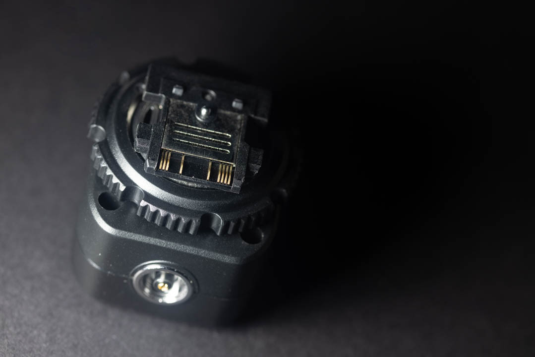 Photo of the foot of the Pixel TF-334 flash adapter, showing the Sony Multi Interface Shoe connection pins.