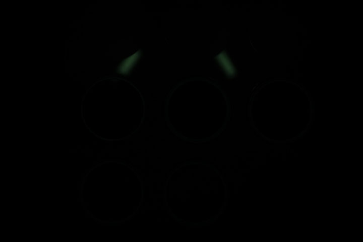 Ultraviolet photo of UV Colour Checker lit by unmodified Canon MT-24EX Macro Twin Flash positioned at end of lens