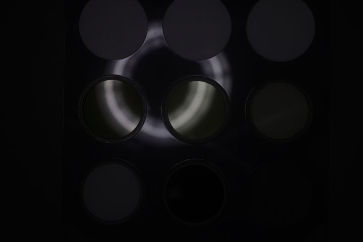 Ultraviolet photo of UV Colour Checker lit by unmodified Godox R200 ring flash positioned at end of lens