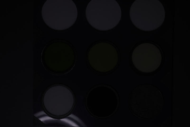 Ultraviolet photo of UV Colour Checker lit by unmodified Godox R200 ring flash positioned off-camera