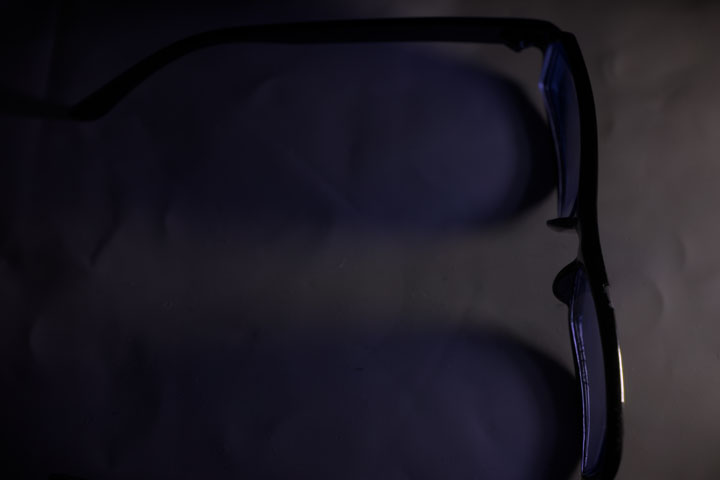 Ultraviolet photo of Standard eyeglasses showing their UV blocking ability