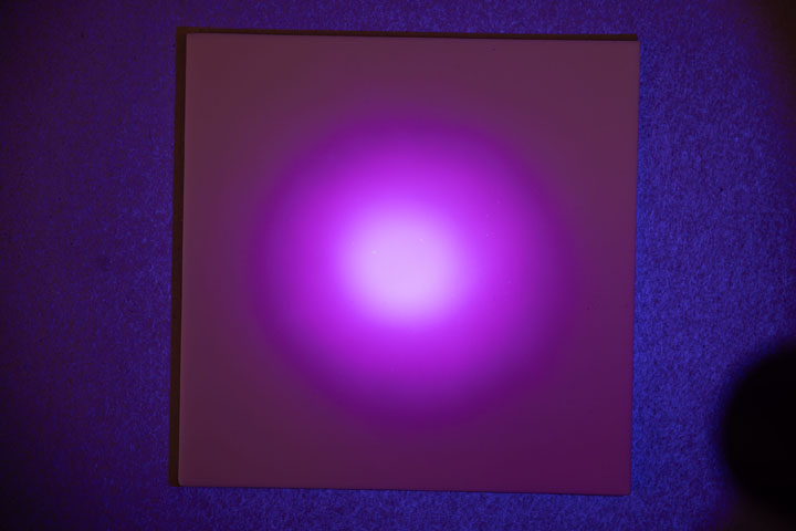 Visible light photo of PTFE on card, lit by Convoy S2+ flashlight
