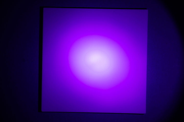 Visible light photo of PTFE on card, lit by UltraFire WF-501B flashlight, shutter speed adjusted to 1/200s