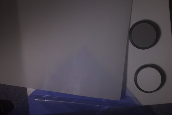 0.25mm thick PTFE sheet over 2mm thick clear Perspex backing