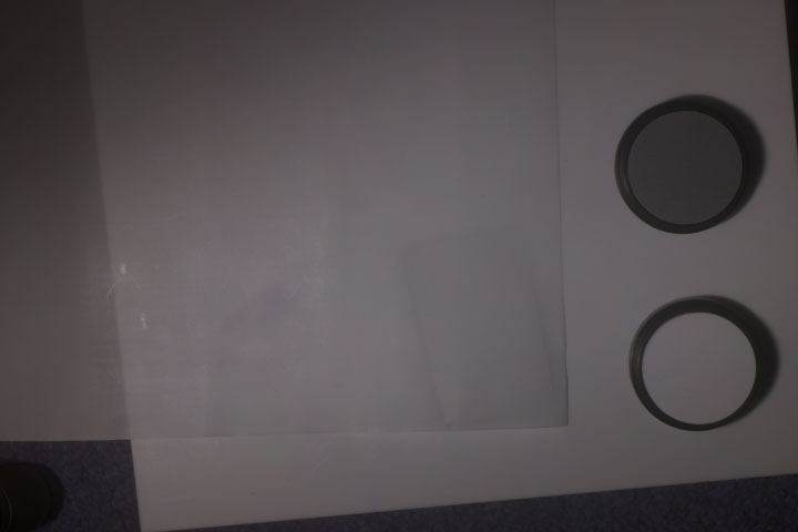 0.25mm thick PTFE sheet over piece of Tetra pak backing