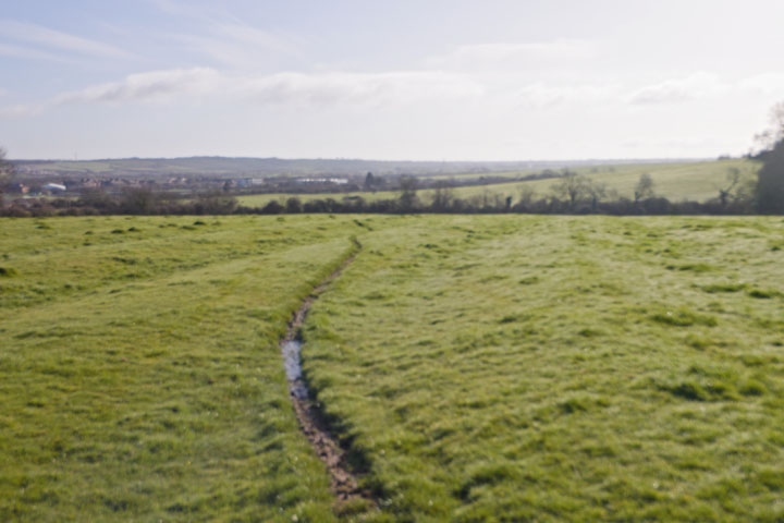 Manual focus, lens focused at 10mm, zoom at 18mm, image is out of focus