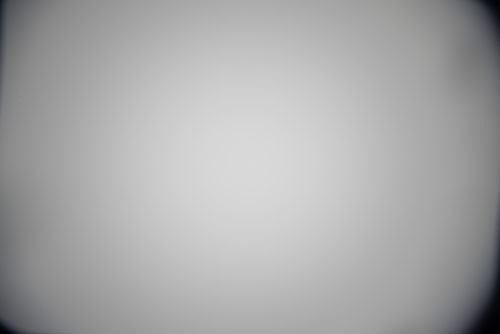 Photo of lightbox taken with Canon EF-S 10-22mm lens with EW-83E hood on full frame at 16mm to show vignetting