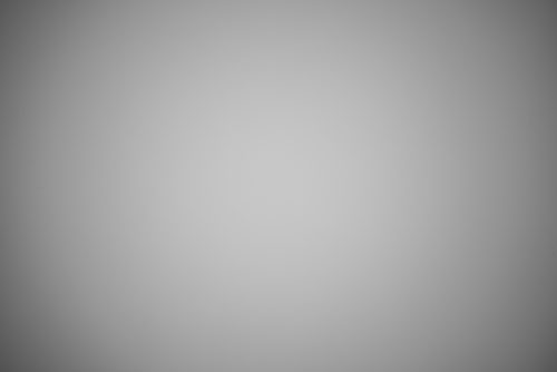 Photo of lightbox taken with Canon EF-S 10-22mm lens with EW-83E hood on full frame at 21mm to show vignetting