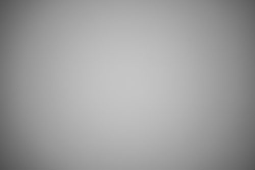 Photo of lightbox taken with Canon EF-S 10-22mm lens with EW-83E hood on full frame at 22mm to show vignetting