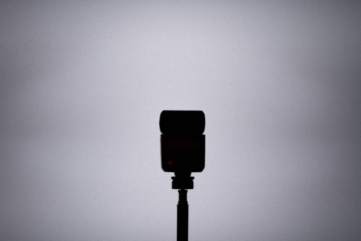 Photo showing light spread / distribution from full spectrum modified Godox TT350 (no Fresnel), 1/32 power