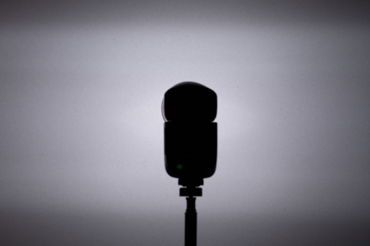 Photo showing light spread / distribution from full spectrum modified Godox V1 (no Fresnel), 1/64 power