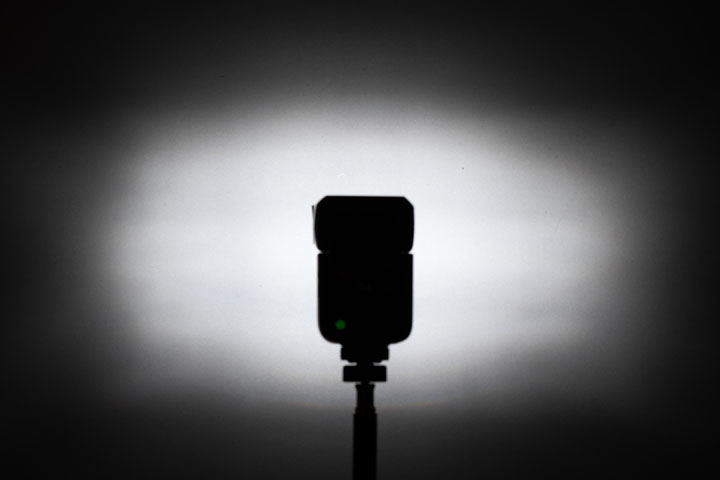 Photo showing light spread / distribution from full spectrum modified Godox V480 with Fresnel and front lens, 1/64 power