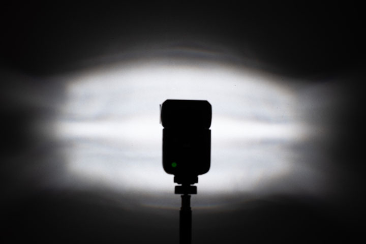 Photo showing light spread / distribution from full spectrum modified Godox V480 with Fresnel, 1/64 power