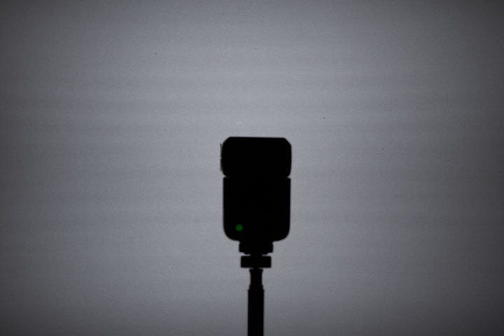 Photo showing light spread / distribution from full spectrum modified Godox V480 with front lens, 1/64 power