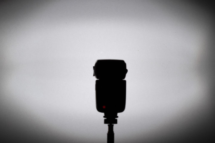 Photo showing light spread / distribution from full spectrum modified Godox V860II with Fresnel, 1/64 power