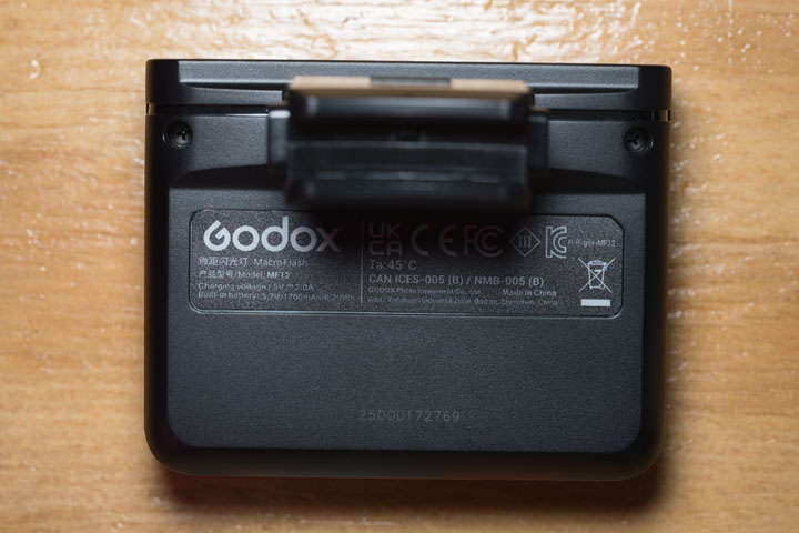 Bottom of the Godox MF12 flash showing the 2 screw holes