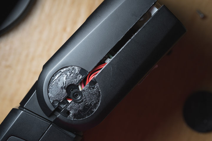 Godox TT350 flash head with the casing apart at the seam