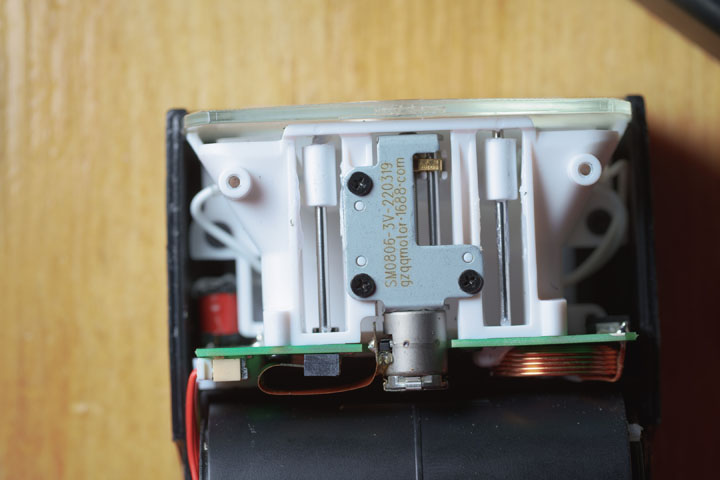 Godox TT350 flash with bottom part of casing removed, showing inside of the flash head