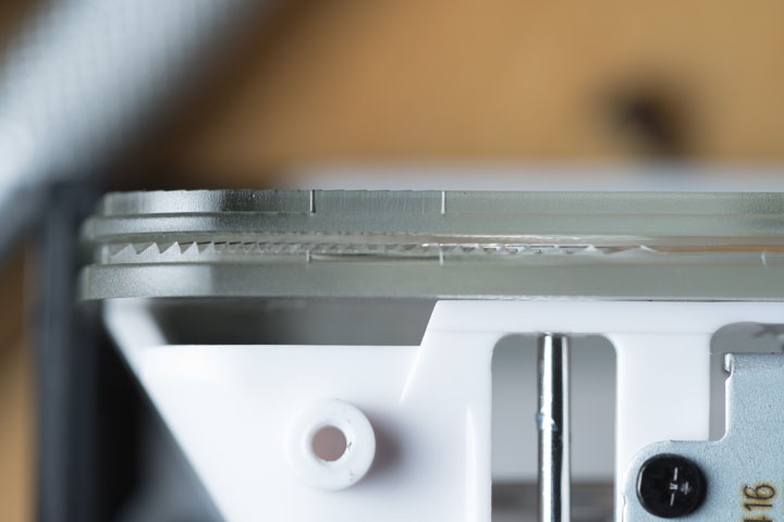 Close-up of the Fresnel and front lens on a dismantled Godox V480 flash