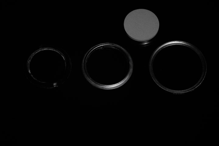 Photo of filter rings before painting with Black 2.0 paint, shot in near infrared (850nm+)