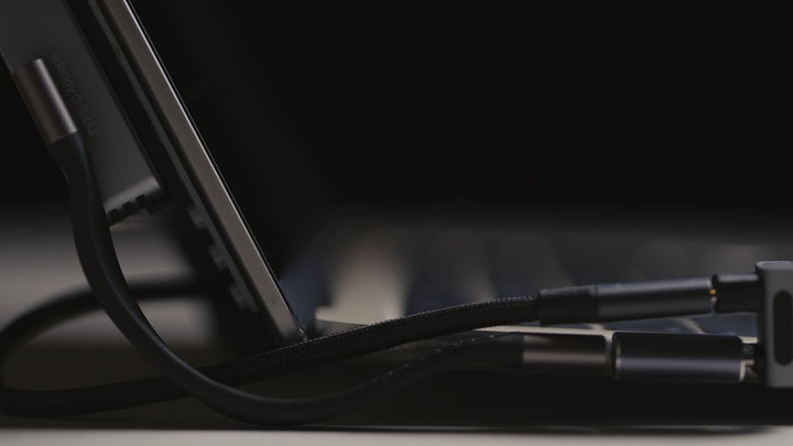 Laptop lifted up off the desk at the rear when lid is opened by having dock positioned slightly over the bottom of the lid