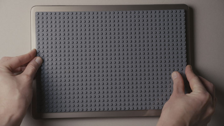 Sticking the lego plate to the macbook cover