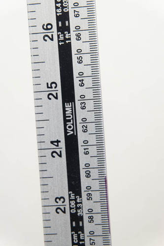 Photo of a ruler taken with Fuji X-A1 and 16-50mm kit lens at 50mm and minimum focus distance and Sonia +1 close-up filter attached