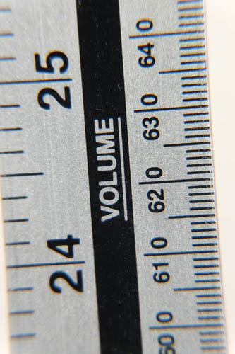 Photo of a ruler taken with Fuji X-A1 and 16-50mm kit lens at 50mm and minimum focus distance and Sonia +10 close-up filter attached