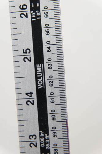 Photo of a ruler taken with Fuji X-A1 and 16-50mm kit lens at 50mm and minimum focus distance and Sonia +2 close-up filter attached