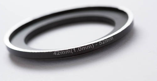 M42 - 52 mm step-up ring after partially filing down the 52 mm thread side